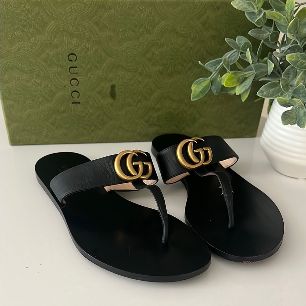 Gucci Black Sandals with Gold Accents